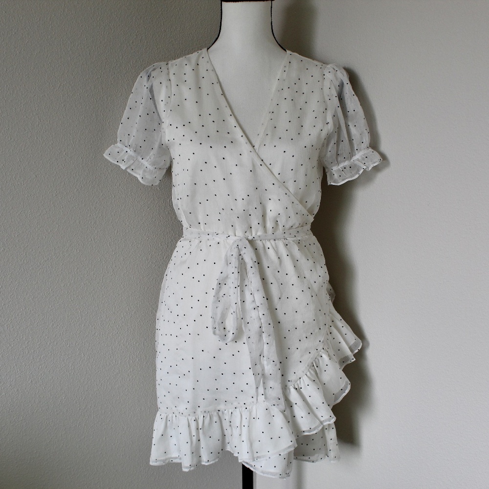 White & Black Polka Dot Sheer Overlay Ruffle Hem Wrap Mini Dress